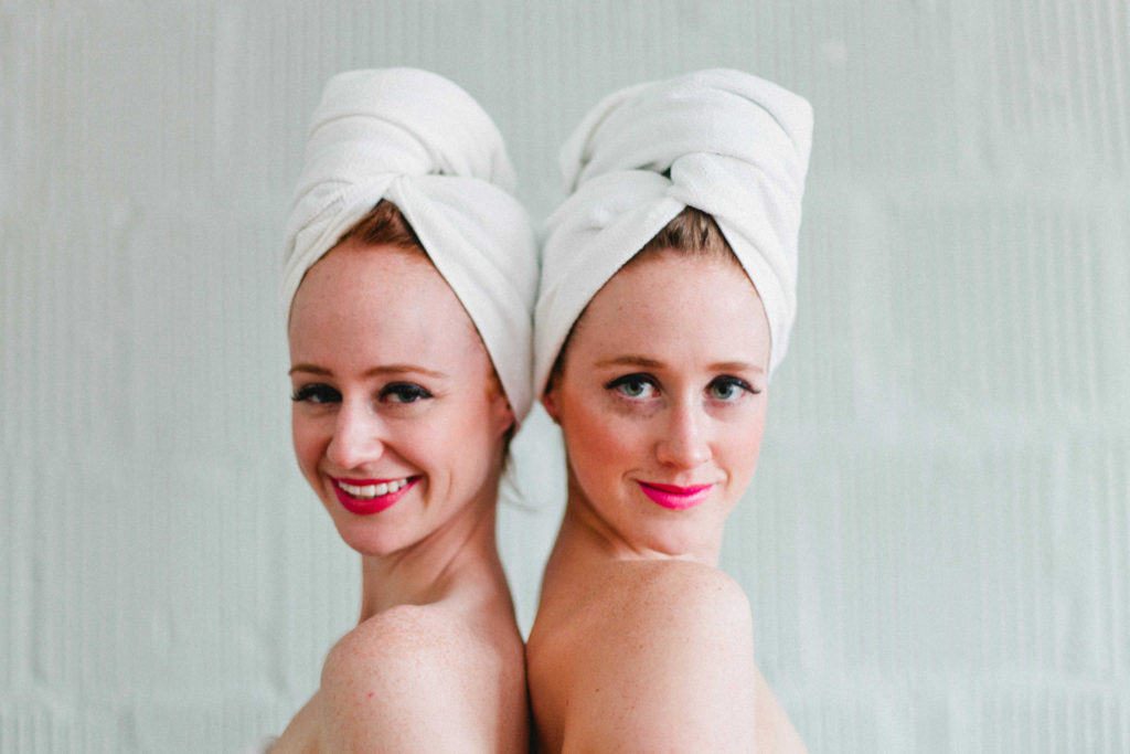 Co-founders, Adrienne & Stephanie, photographed with an Aquis microfiber hair towel.