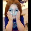 Watch this adorable little redhead pull off the funniest glitter stunt