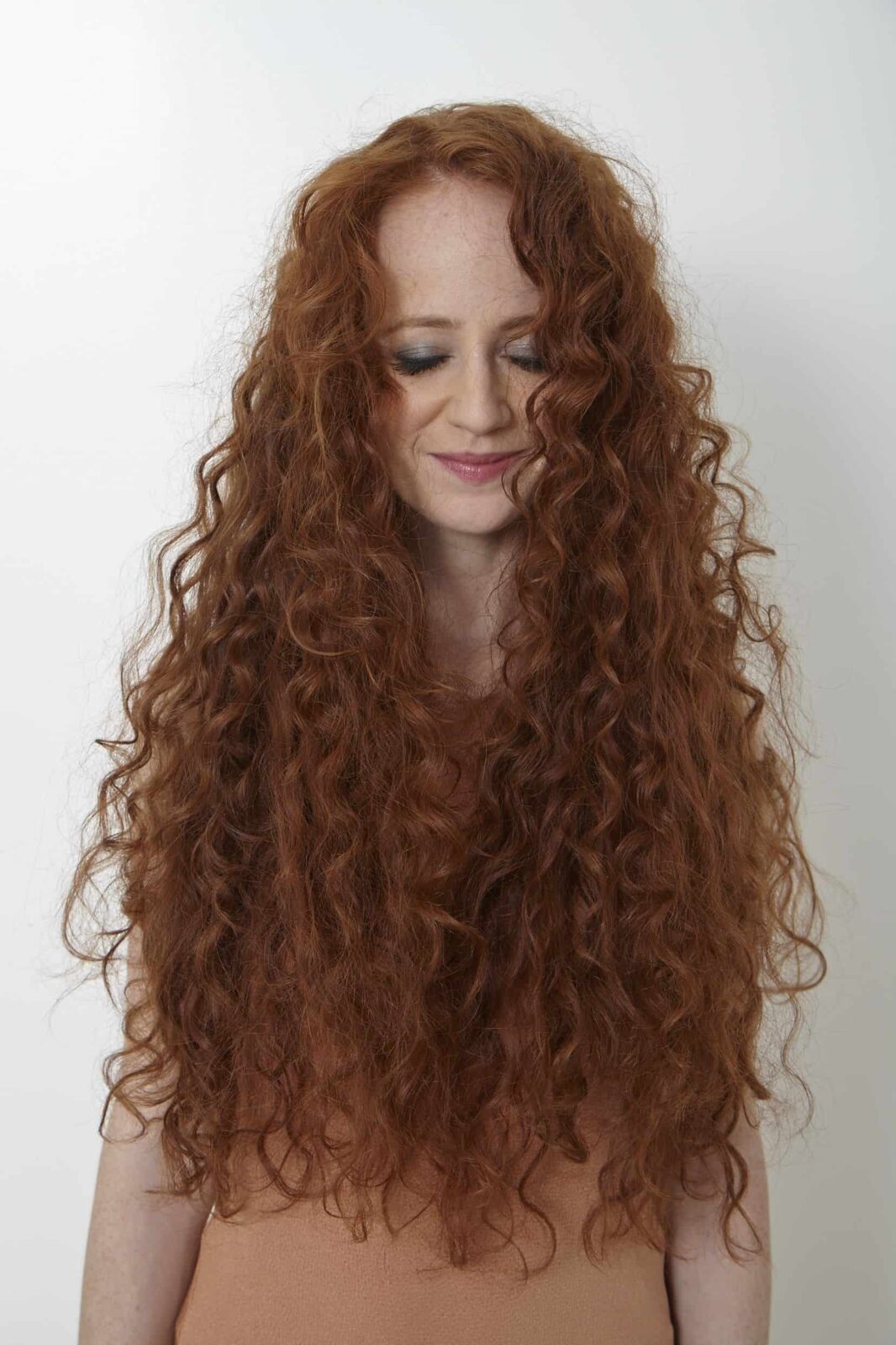 4 Easy Ways to Care for Your Curly Red Hair - Redhead Beauty