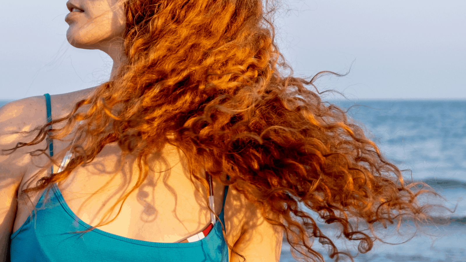 How to Protect Your Red Hair From Sun, Chlorine, and Salt Water